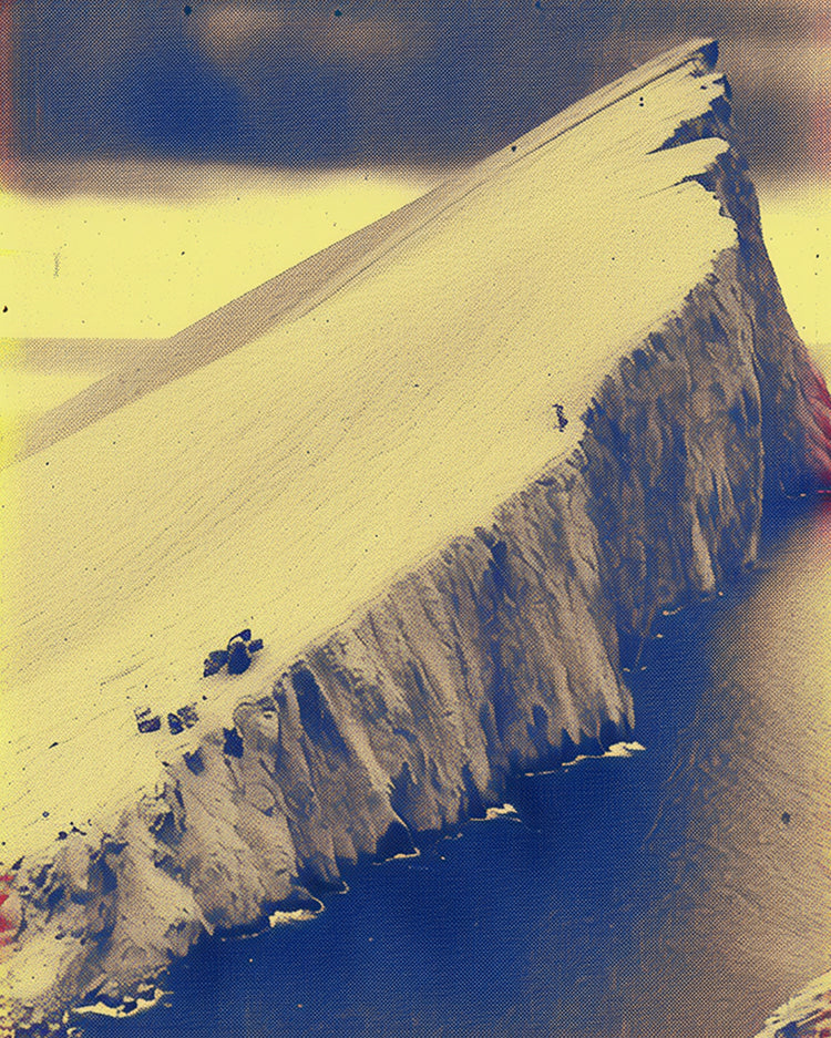 Aerial view of a snow-covered cliff in Antarctica. The scene is bathed in soft yellow light and exudes elegance reminiscent of classic film photography. This image portrays scenes that were once vibrant but now stood frozen for years on end